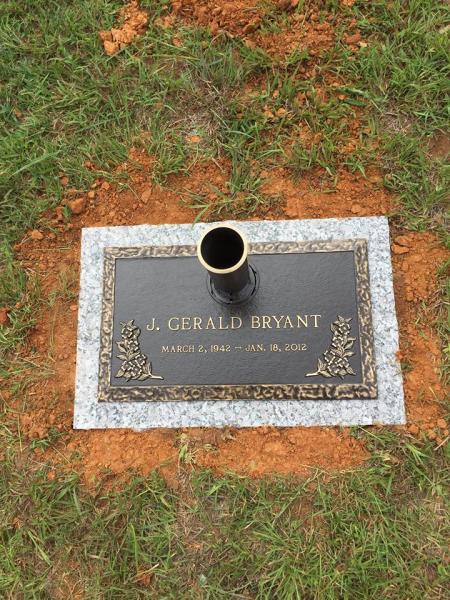 This is a recent installment of one our options for a single granite monument with a built in vase for fresh flowers. 